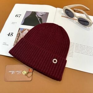 Elegant Maroon Knit Beanie with Metal Detail